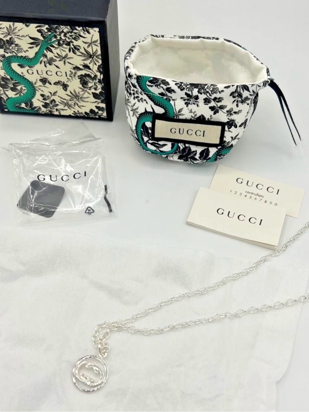 Gucci White Floral Pouch with Green Snake Motif